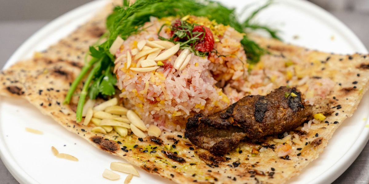 Lamb mandi on spiced rice